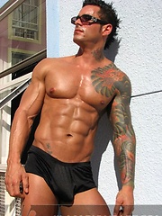 Jock poses outside and jerks off on bed, Added: 2011-12-05 by Mark Wolff